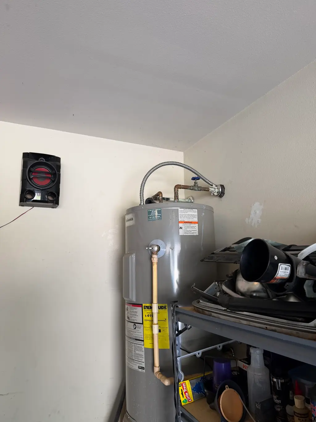 Second water heater installation completed in a Shreveport garage by Roach Plumbing & Heating
